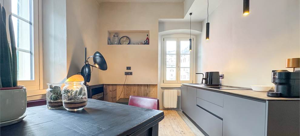 Soggiorno con cucina a vista